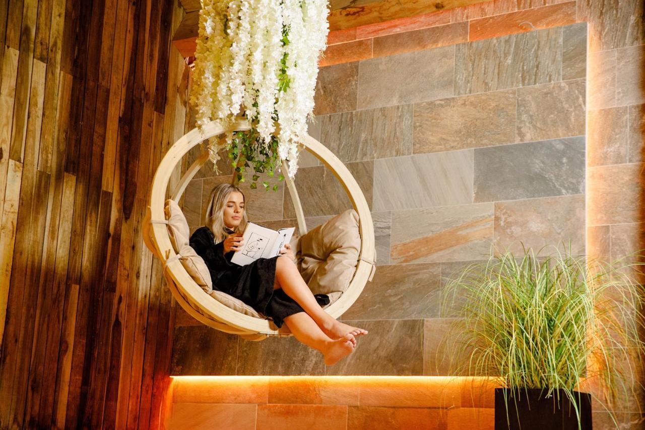 Lanelay Hall Hotel & Spa Hensol Exterior foto A woman relaxing in a spa
